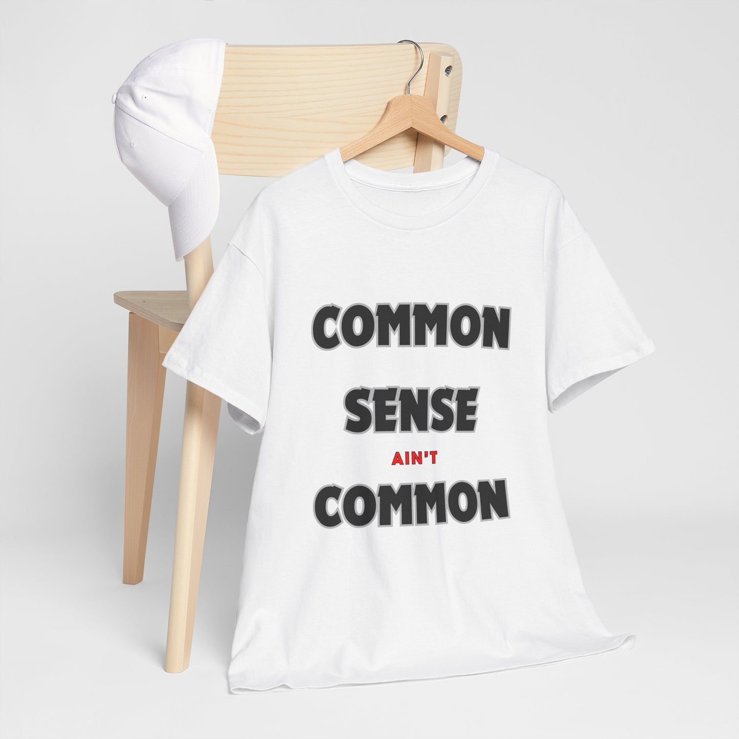 COMMON SENSE AIN'T COMMON - 2- Unisex Heavy Cotton Tee