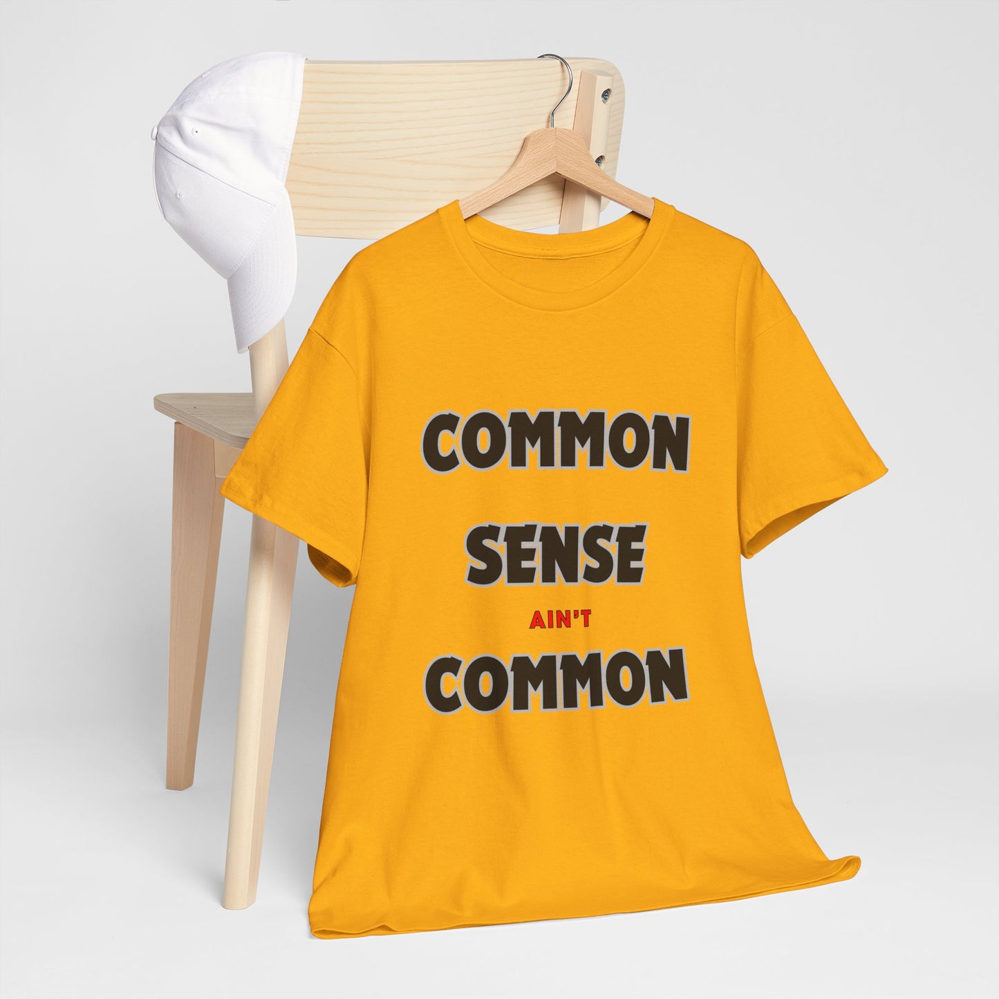 COMMON SENSE AIN'T COMMON - 2- Unisex Heavy Cotton Tee
