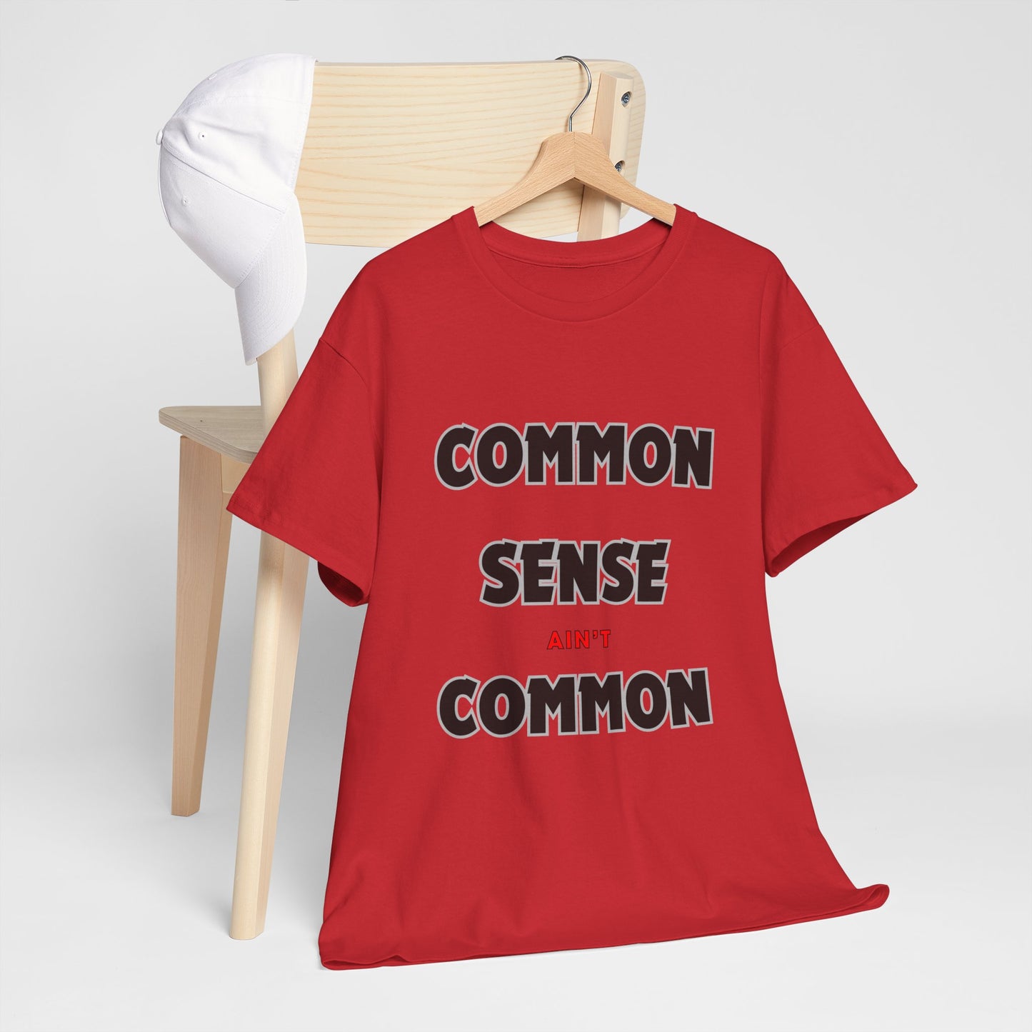 COMMON SENSE AIN'T COMMON - 2- Unisex Heavy Cotton Tee