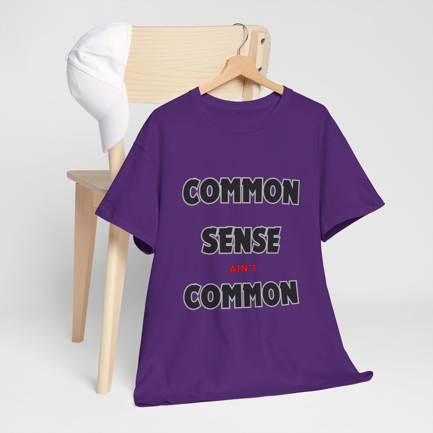 COMMON SENSE AIN'T COMMON - 2- Unisex Heavy Cotton Tee