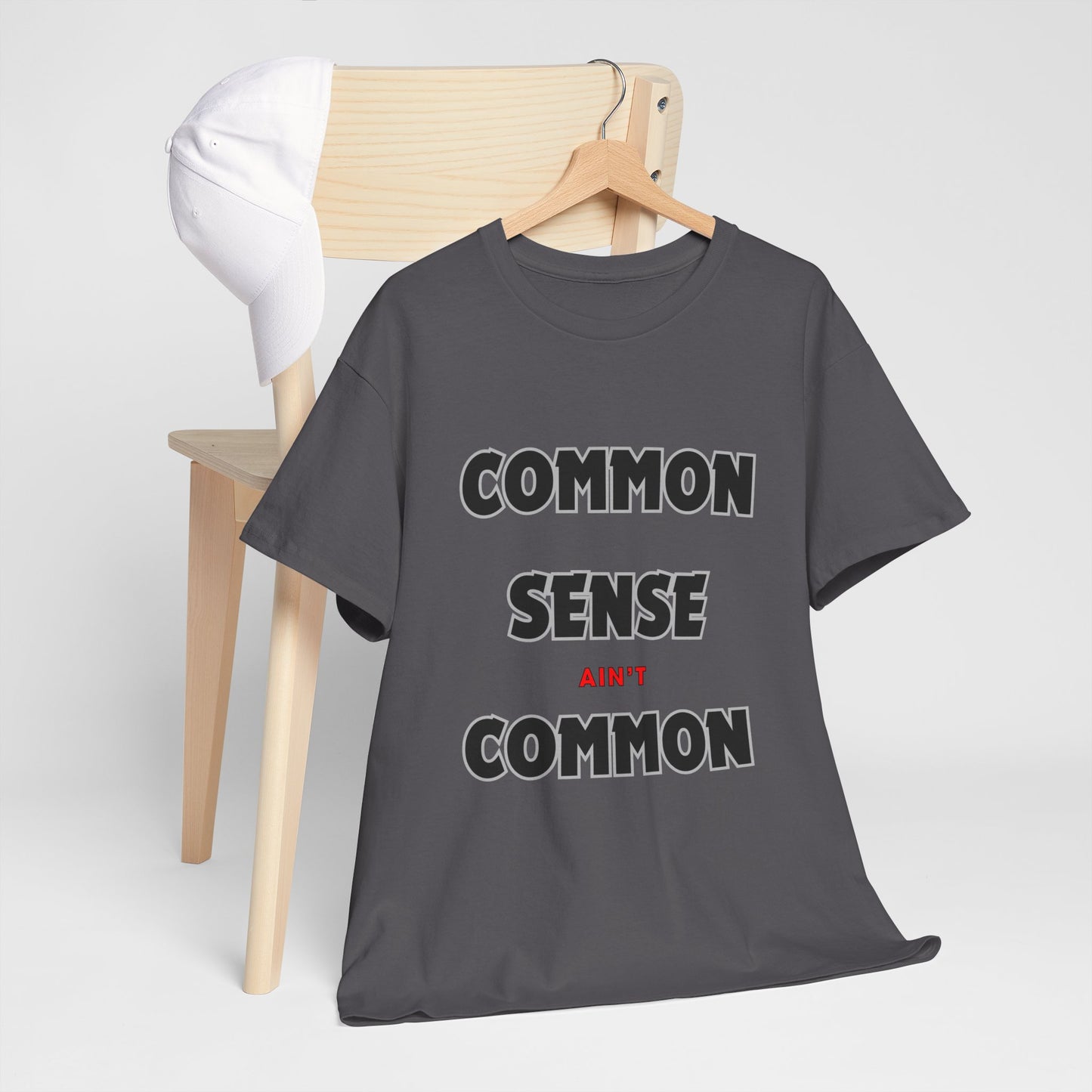 COMMON SENSE AIN'T COMMON - 2- Unisex Heavy Cotton Tee